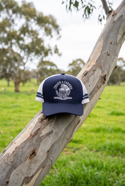 Navy and white striped trucker cap with globe crest, second view